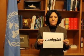 Leila Zerrougui, Special Representative of the Secretary-General for Children and Armed Conflict, holds a sign with the hashtag #WhatDoesItTake in Arabic. Copyrights: OSRSG-CAAC