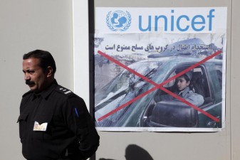 At the child protection unit in Herat's National Police recruitment centre, posters remind everyone that the recruitment of children is prohibited. ©United Nations